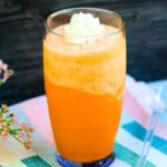 Thai tea smoothie served in a glass cup.