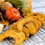 Kabocha pumpkin squash fries layed out on a drying rack.