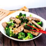 Japanese style BBQ Beef n' Broccoli served in a white bowl.
