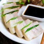 Slices of Taiwanese style boiled pork belly topped with green onion served with soy garlic sauce.