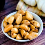 Japanese style pickled garlic served in a dish.