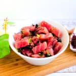 Hawaiian style ahi poke served in a white bowl.