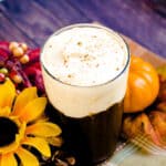 Starbucks inspired pumpkin cream cold brew served in a glass cup, side angle shot.