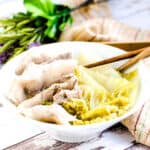 Japanese napa cabbage soup served in a white bowl.