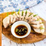 Slices of steamed boiled pork belly topped served with soy garlic sauce.