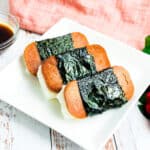 Stacked spam musubi on a plate.