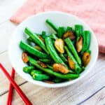Garlic green beans served on a plate.
