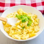 Sweet Japanese scrambled egg being picked up with a spoon.