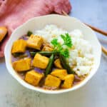 Japanese tofu curry served on a plate over rice.