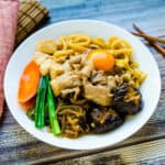 Pork sukiyaki served in a bowl.