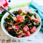 Ahi pole bowl being scooped up with a spoon.