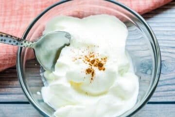 Sea salt foam being scooped out with spoon.