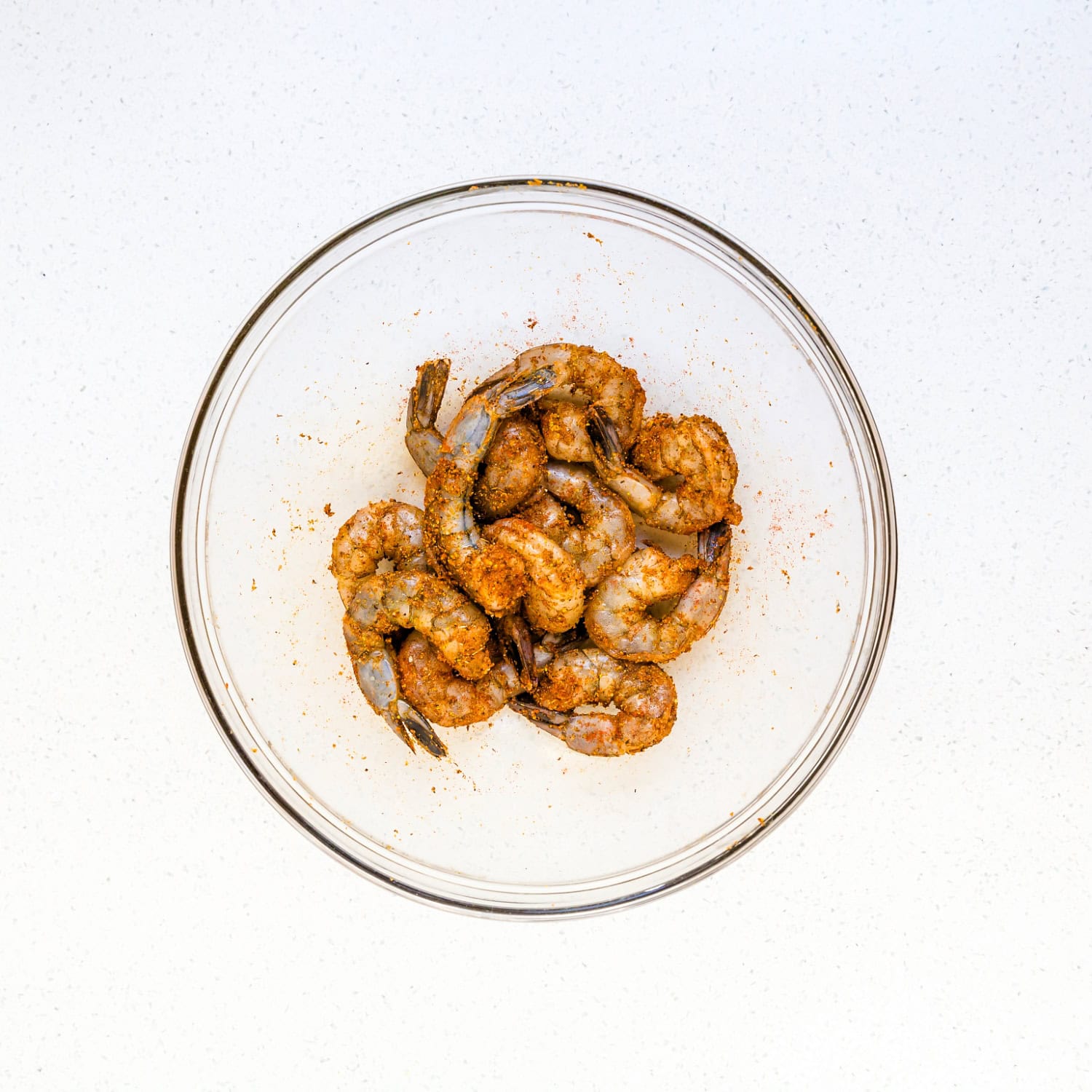 Dry seasoning for grilling shrimp in a bowl. 