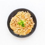 Simmered garlic enoki mushroom served on a plate.