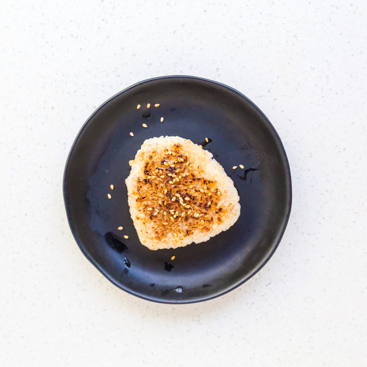 Soy garlic rice balls served on a plate. 