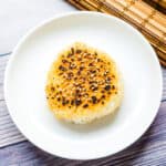 Miso yaki onigiri rice balls served on a plate.