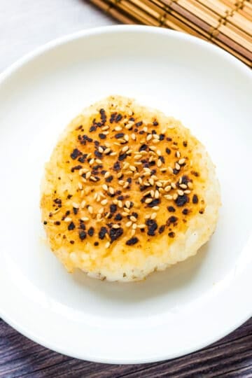 Miso yaki onigiri rice balls served on a plate.