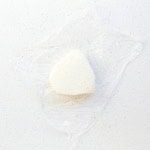 Rice ball on saran wrap.