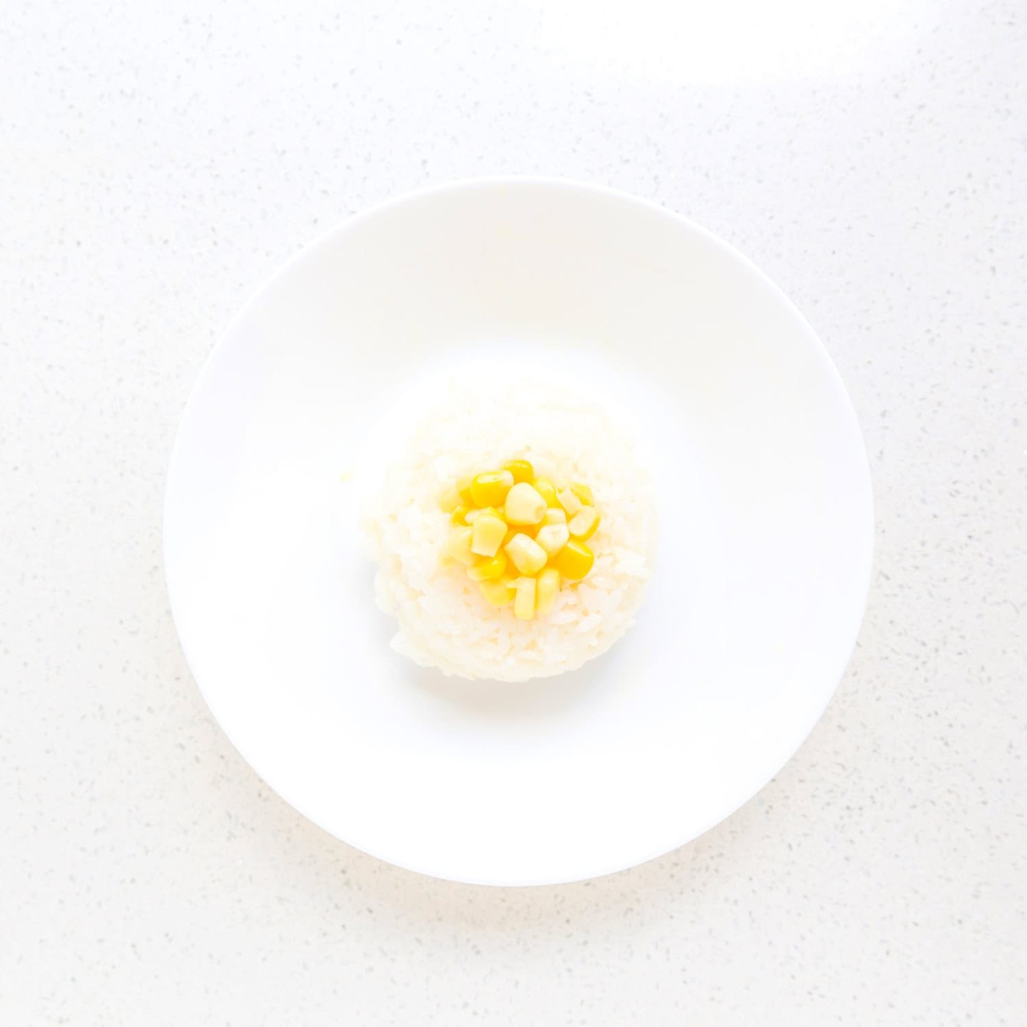 Butter corn in bowl.