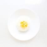 Butter corn in a bowl.