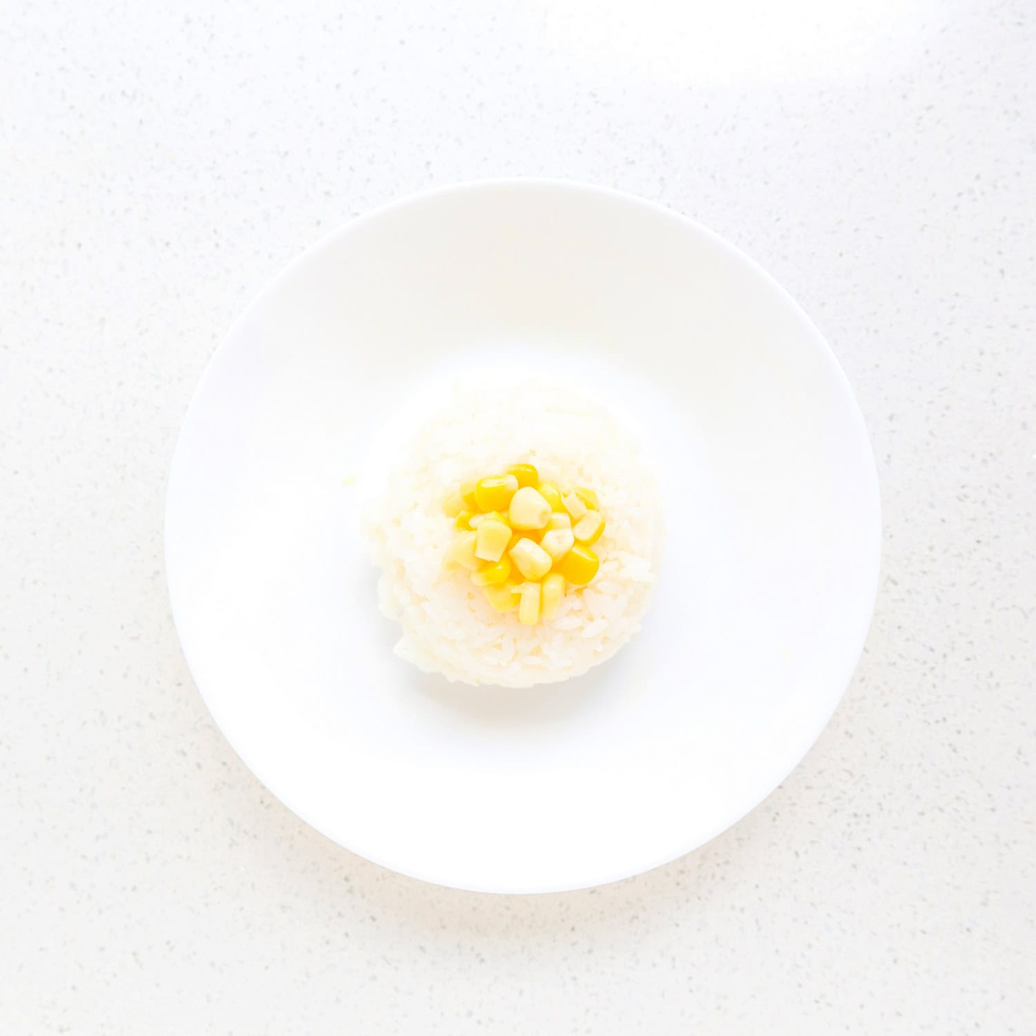 Butter corn in bowl. 