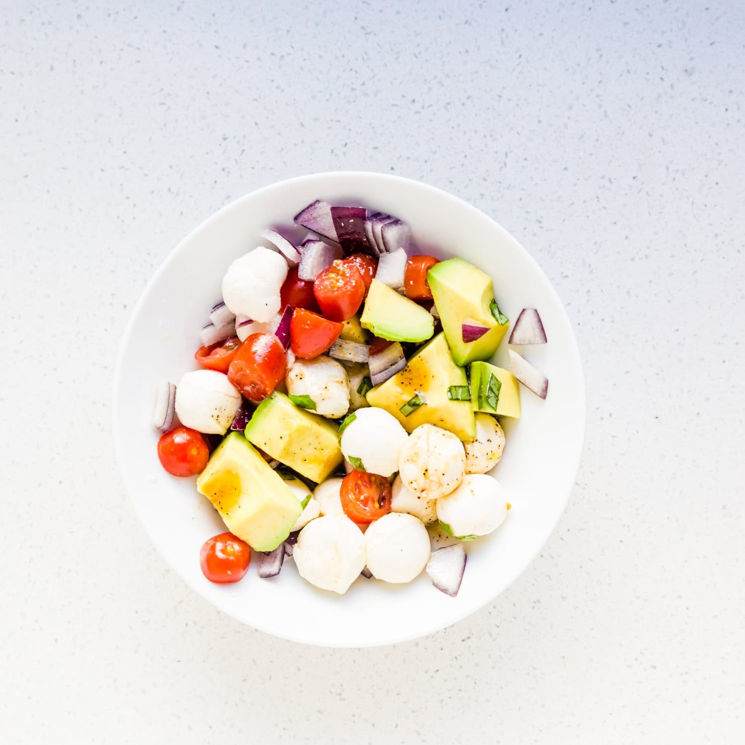 Avocado Mozzarella Salad in a bowl.