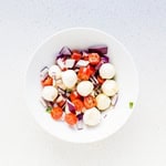 Avocado mozzarella salad in a bowl.